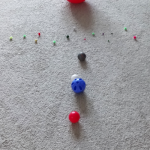 Practice placing the planets in order using balls.
