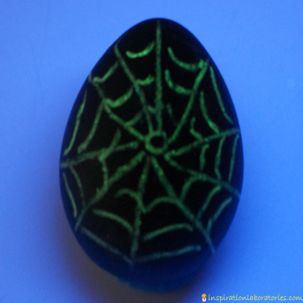 green spiderweb egg