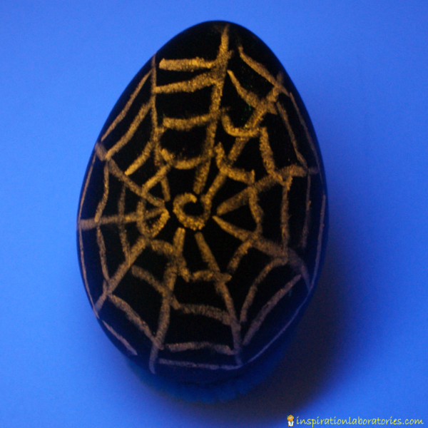 orange spiderweb egg