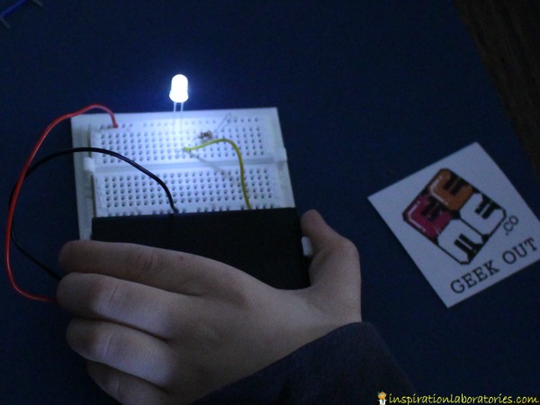 Make a simple LED circuit with a breadboard.