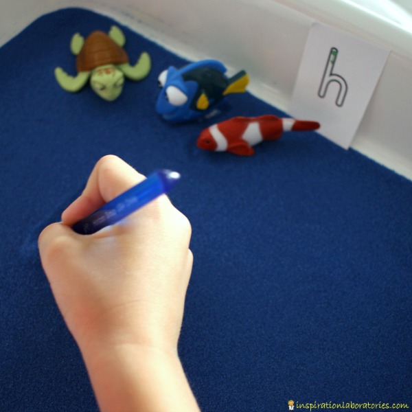 Use a Finding Dory Sensory Writing Tray to practice lowercase letter formation.