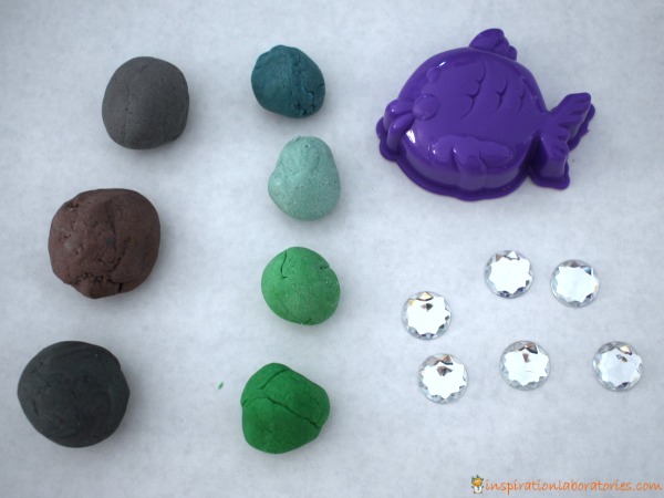 Set up an invitation to play with play dough.