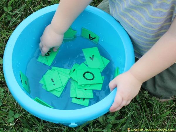 Toddler will love this water race to learn letters and numbers!