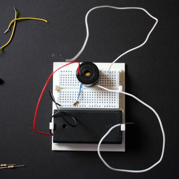 Learn how to build a buzzer circuit and simple alarm system.