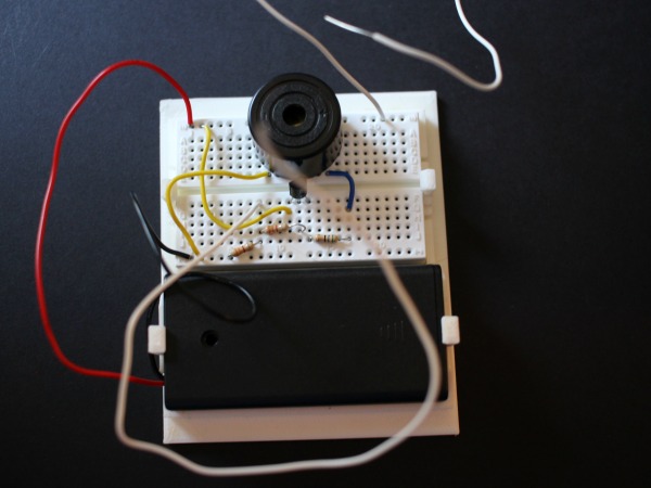 Learn about electronics by building a simple alarm system.
