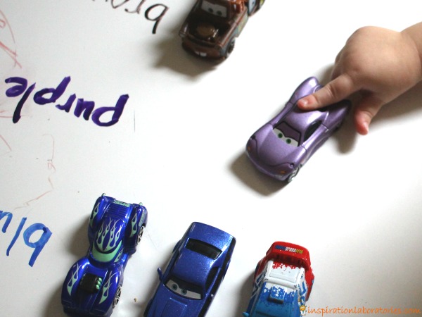 Use toy cars to learn colors.