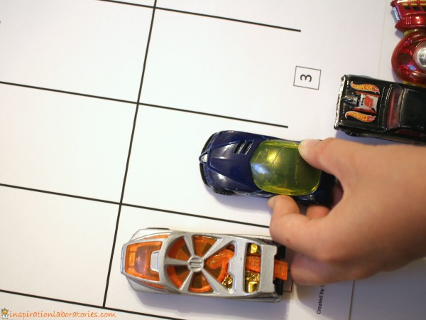 Practice number recognition and counting with a fun car parking math game.