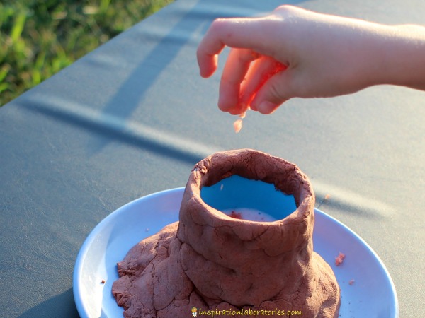 Make a pop rocks volcano. It's an easy science experiment for kids.