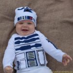 Use a freezer paper stencil to make an R2-D2 costume for baby.