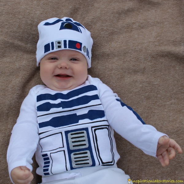 Use a freezer paper stencil to make an R2-D2 costume for baby.