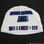 Use a freezer paper stencil to make an R2-D2 costume for baby.