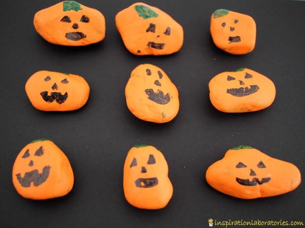 Use painted pumpkin rocks for a fun alphabet matching game.