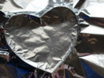 Make painted foil hearts for Valentine’s Day.