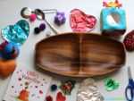 Learn how to make and use painted foil hearts to explore shiny vs. dull. This is a great preschool science activity inspired by Ollie’s Valentine.