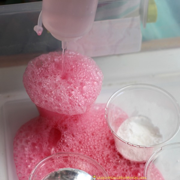 A fizzy color mixing experiment is an easy kitchen science experiment for kids.