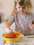 Set up a simple science lab for kids to encourage pretend play and science skills.