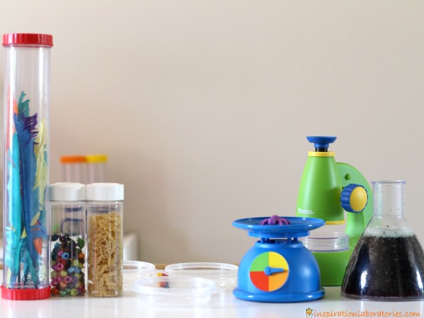 Set up a simple science lab for kids to encourage pretend play and science skills.