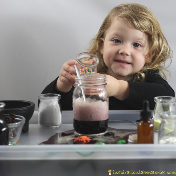 Make fizzy potions with fruit juice inspired by Room on the Broom by Julia Donaldson. A fun Halloween science activity for kids.