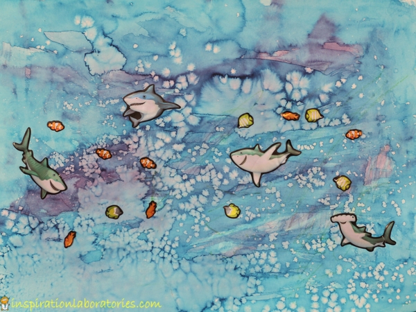 Use a simple watercolor art technique to create ocean art with toddlers.