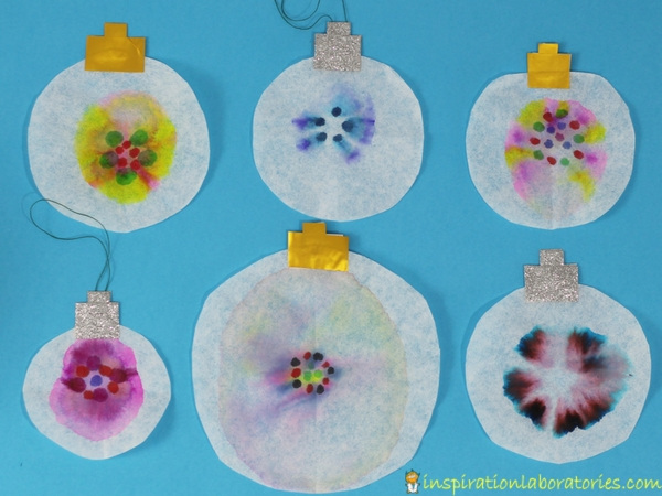 Use Sharpie permanent markers and Mr. Sketch scented markers to make colorful tie dye Christmas ornaments using paper chromatography. This combination of science and art makes for a fantastic STEAM project for kids. Sponsored by #GiveColorfully