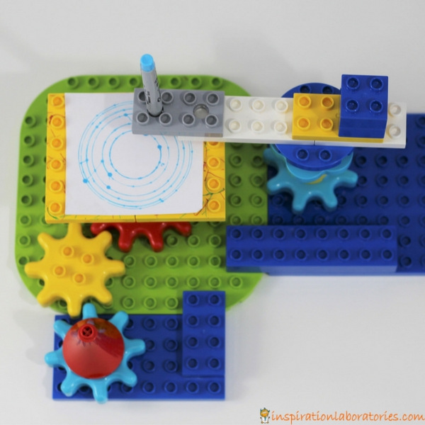 Design and build a LEGO drawing machine with DUPLO gears and bricks. Makes a great STEAM project for kids.