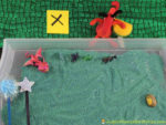 Set up a dragon themed sensory writing tray is to practice pre-writing skills, letter formation, handwriting, and more!