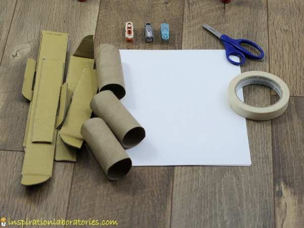 cardboard, paper, hexbugs, scissors, tape