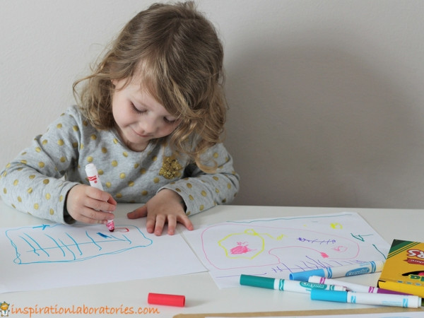 girl drawing a map