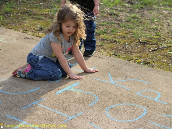 play a chalk alphabet game