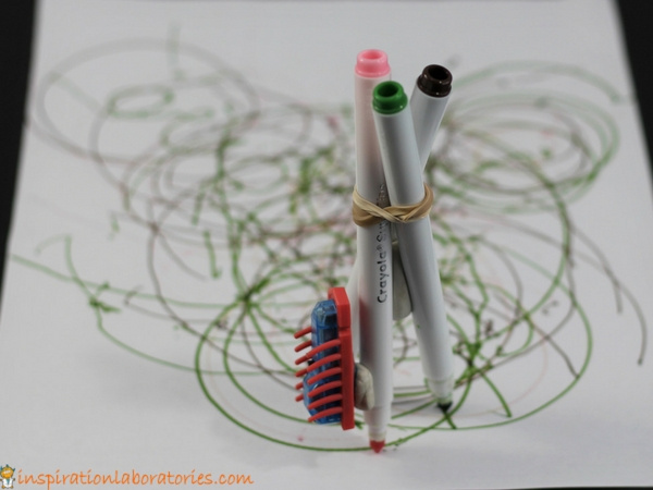 HEXBUG drawbot made with 3 markers, rubber bands, and a HEXBUG