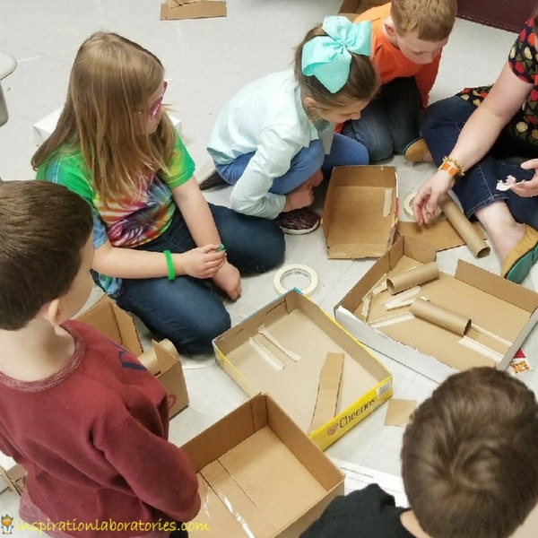 kids building mazes for HEXBUG robots