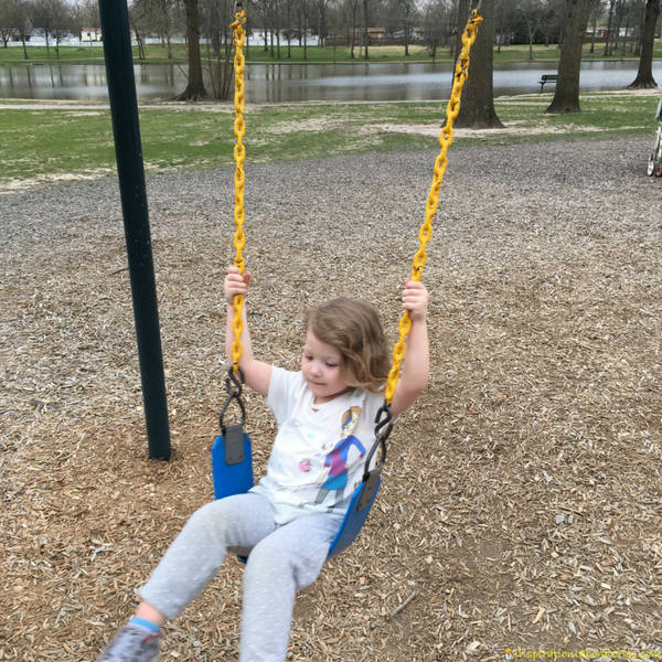 child swinging