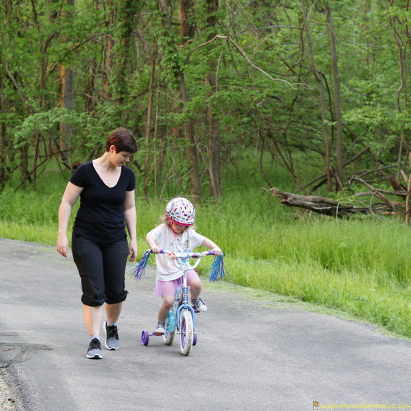 Go for a jog while your kid rides her bike.
