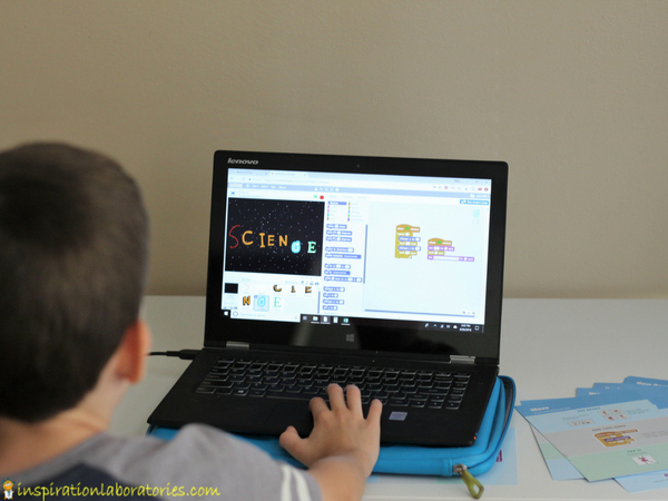 child using Animate a Name program on computer
