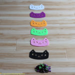 Use cat erasers and felt cats for a simple preschool Halloween game.