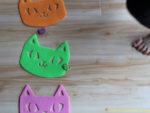 Use cat erasers and felt cats for a simple preschool Halloween game.