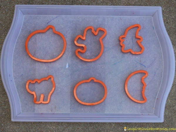 Halloween cookie cutters on tray