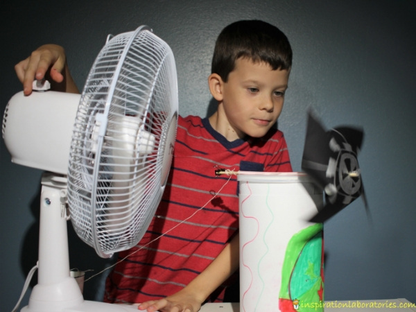 child-made windmill that can lift a paper cup