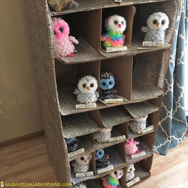 Harry Potter birthday party - cardboard box owlery with toy owls
