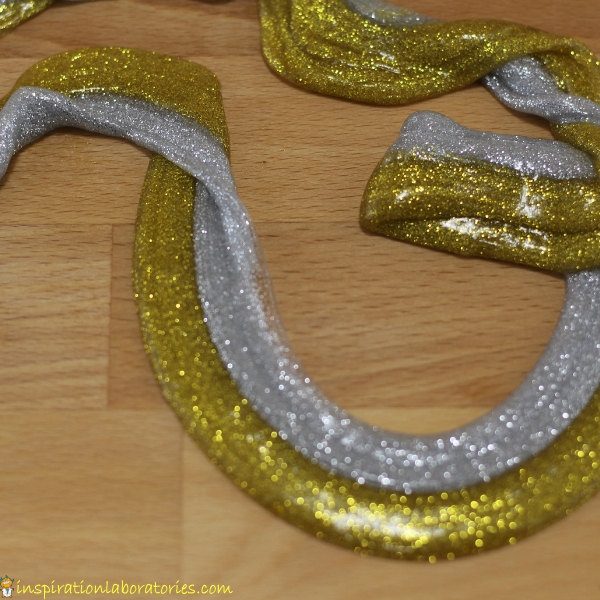 silver and gold glitter glue saline solution slime
