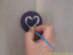 Use fabric paint to create your own valentine squishy.