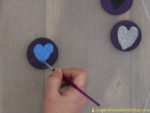 Use fabric paint to create your own valentine squishy.