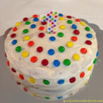 1st birthday polka dot cake decorated with M&M’s