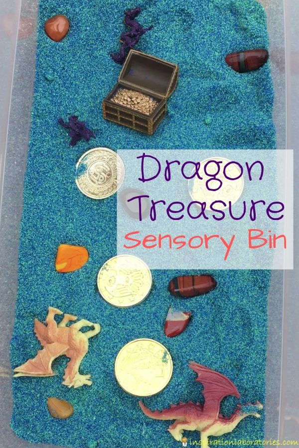 Dragon Treasure Sensory Bin - set up a simple sensory bin with colored sand, treasures, and dragons.