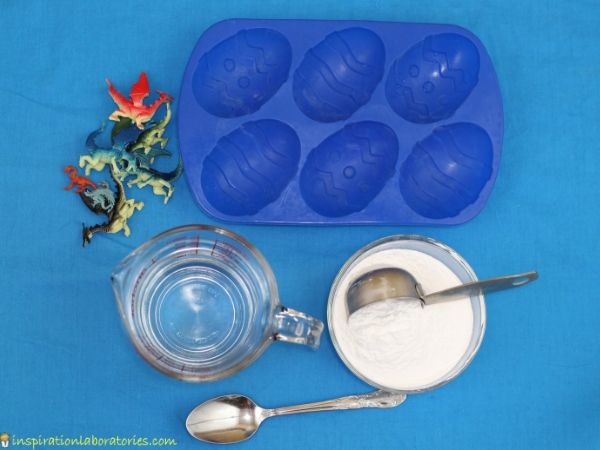 dragon toys, silicon egg mold, water, baking soda