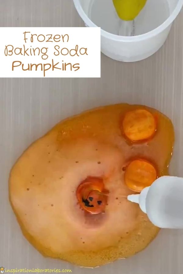 Title picture for blog post: Frozen Baking Soda Pumpkins - shows stream of vinegar landing on mini pumpkins made of frozen baking soda